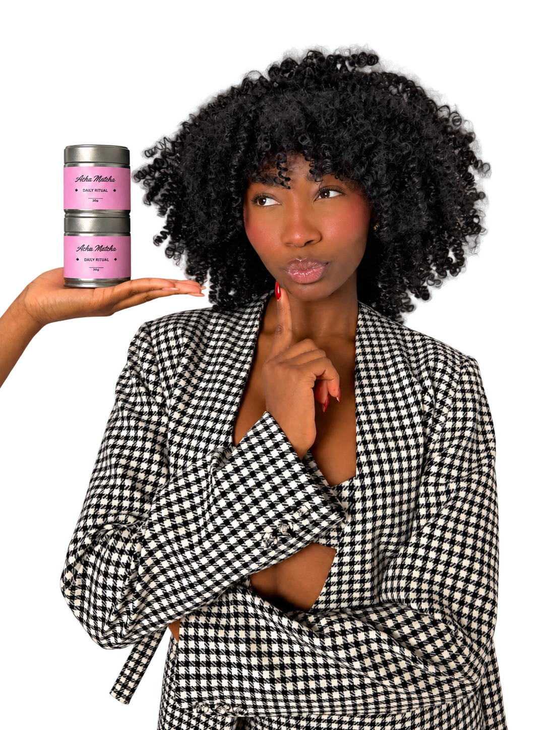 Nessa holding her pink Acha Matcha tins